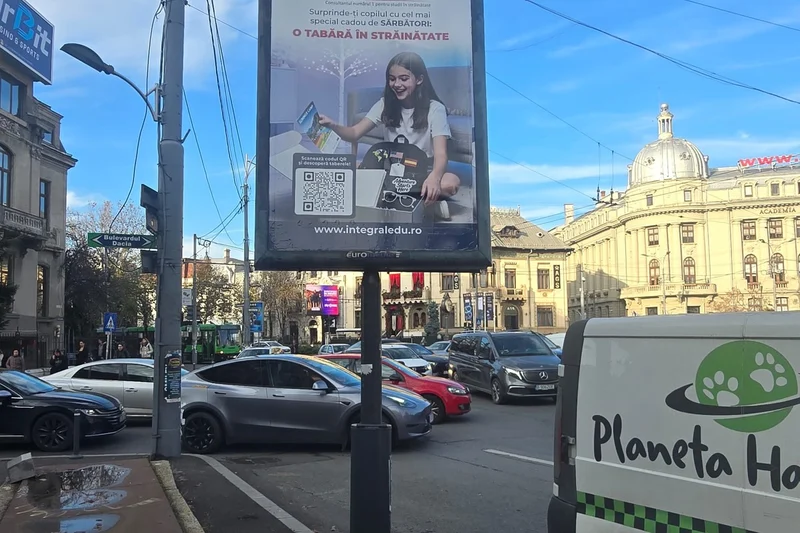 Panou city light Mora Group in Piata Romana, Bucuresti