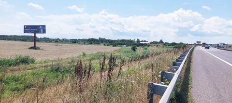 Unipol publicitar 14x4 m Mora Group pe Autostrada A3 Bucuresti-Ploiesti langa Gruiu, Ilfov — panou single-pole in camp deschis, vizibil traficului auto de mare viteza